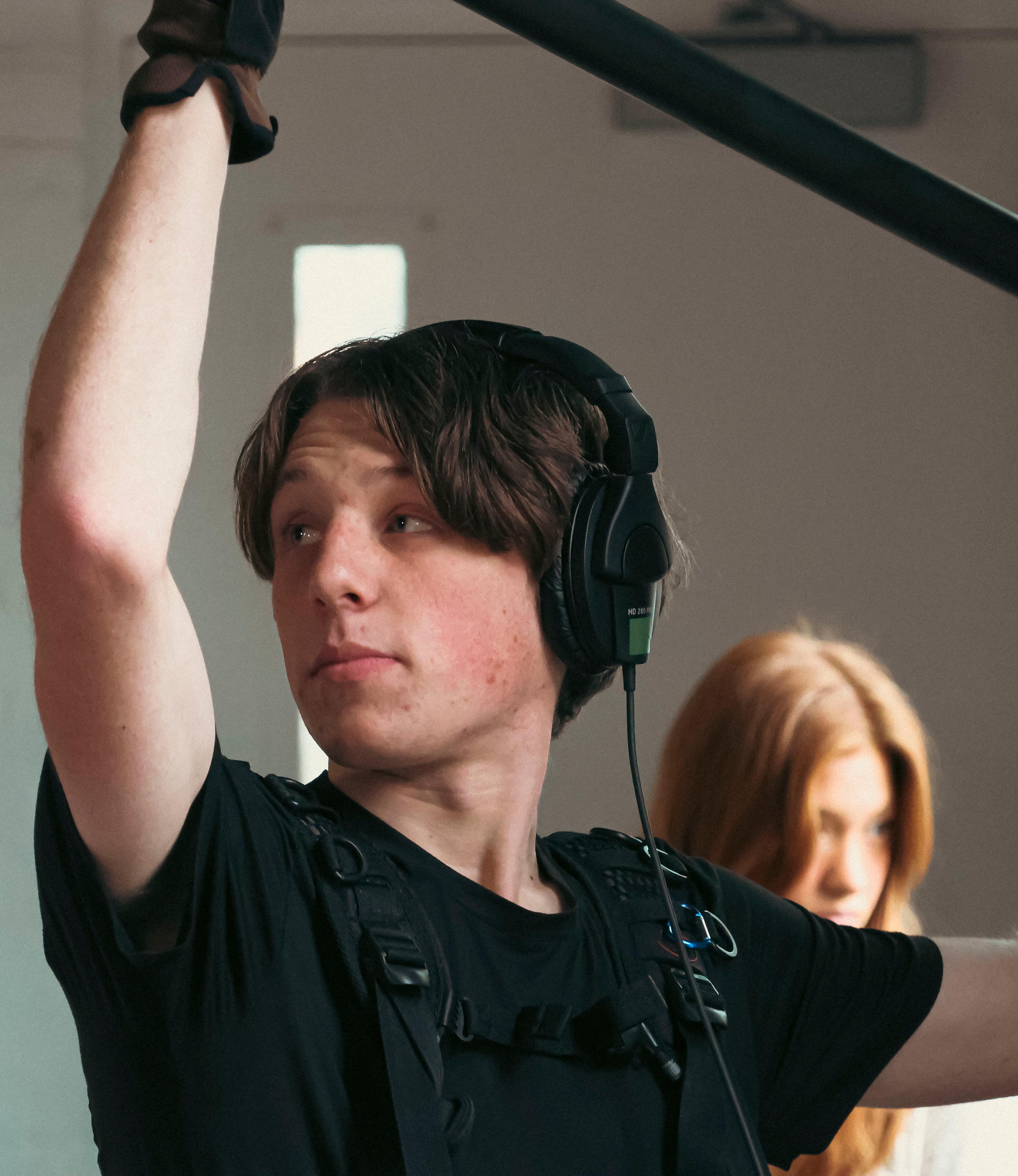 Myself while on set, holding a boom during a scene